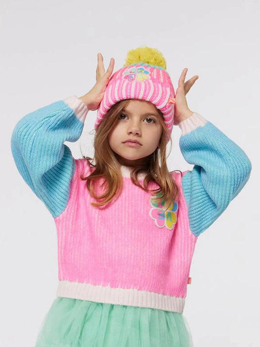 Girl modelling the Billieblush bobble hat.