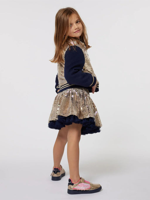 Girl modelling the Billieblush sequin skirt.