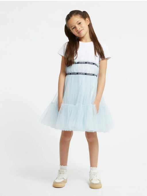 Girl modelling the Guess Tulle Dress in blue. 