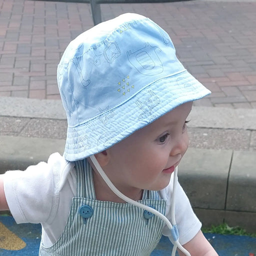 Baby boy wearing the Ziggle Blue Safari Sun Hat. 