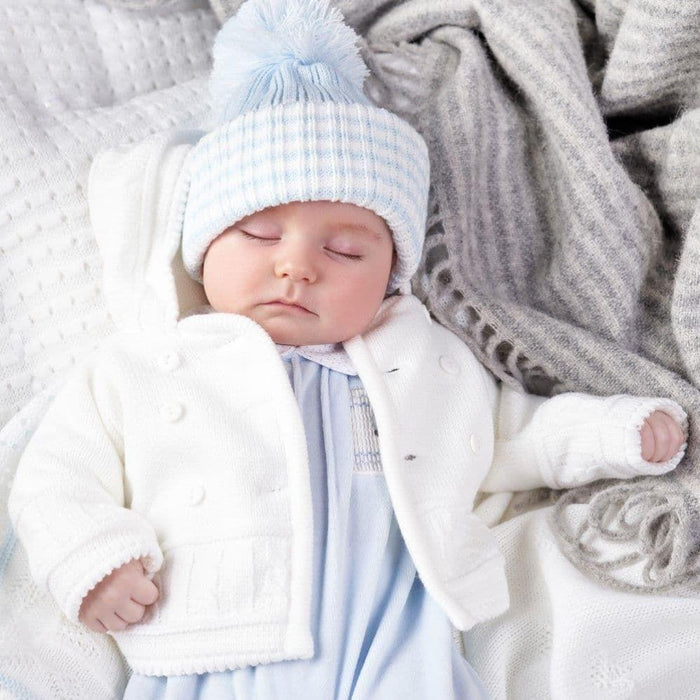 Baby modelling the Dandelion White Knitted Jacket - av1570