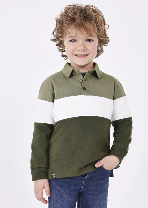 Boy modelling the Mayoral colourblock polo shirt.
