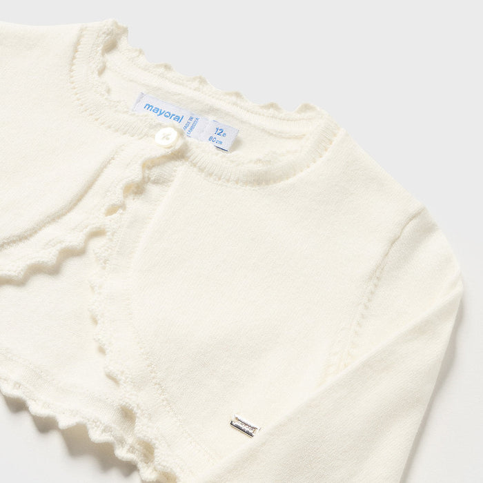 Closer look at the Mayoral cream knitted shrug.