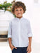 Boy modelling the Mayoral linen shirt.