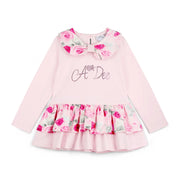 Girl's pale pink long sleeve tunic.