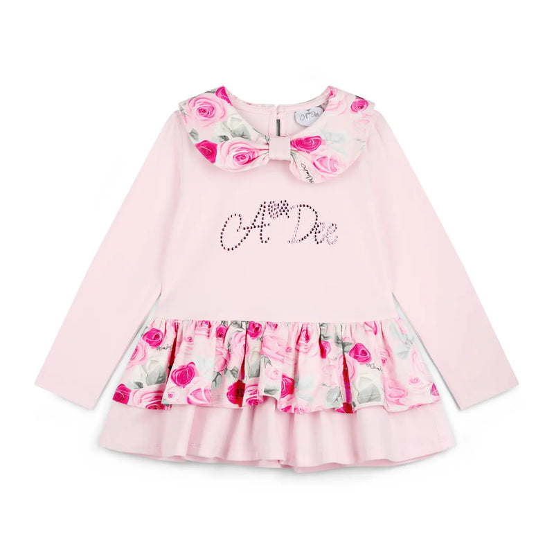 Girl's pale pink long sleeve tunic.