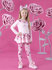 Smiling Girl modelling the A Dee adeline leggings set.