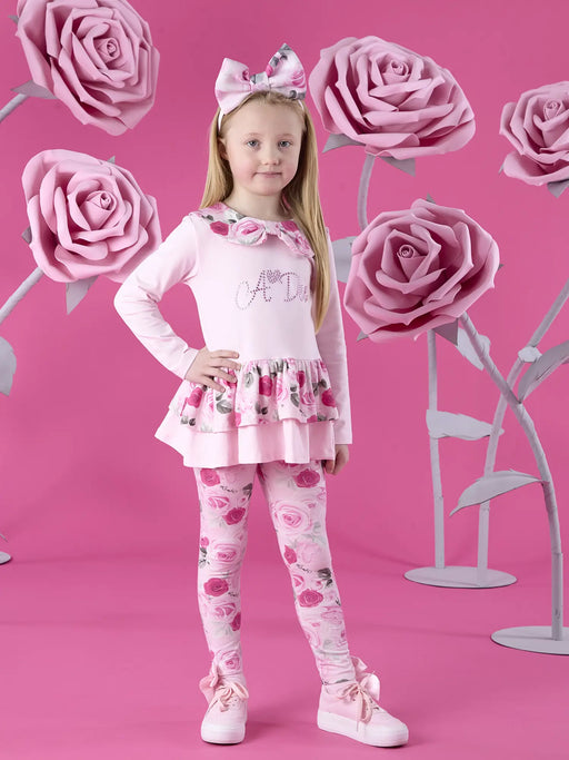Smiling Girl modelling the A Dee adeline leggings set.