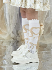 Girl modelling the A Dee alessandra knee socks.