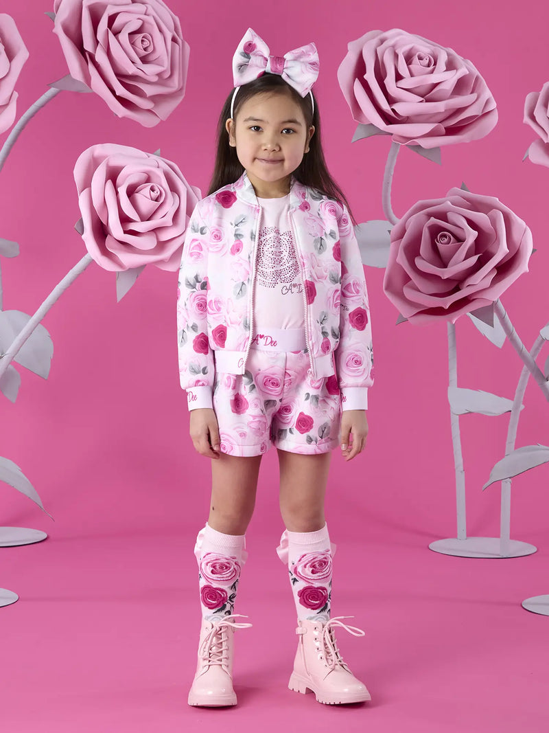 A Dee pink alice bomber jacket, modelled by girl.