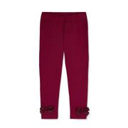 Girl's burgundy leggings.