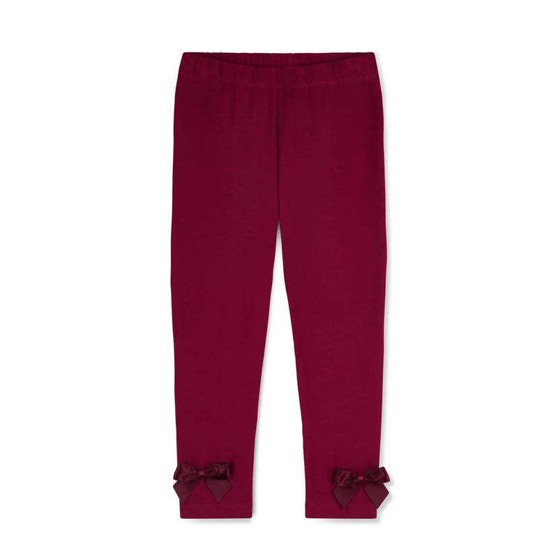 Girl's burgundy leggings.