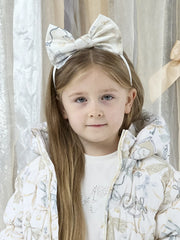 Smiling Girl modelling the A Dee allie headband.