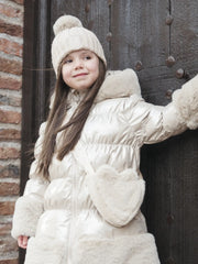 Girl modelling the A Dee alma heart bag.
