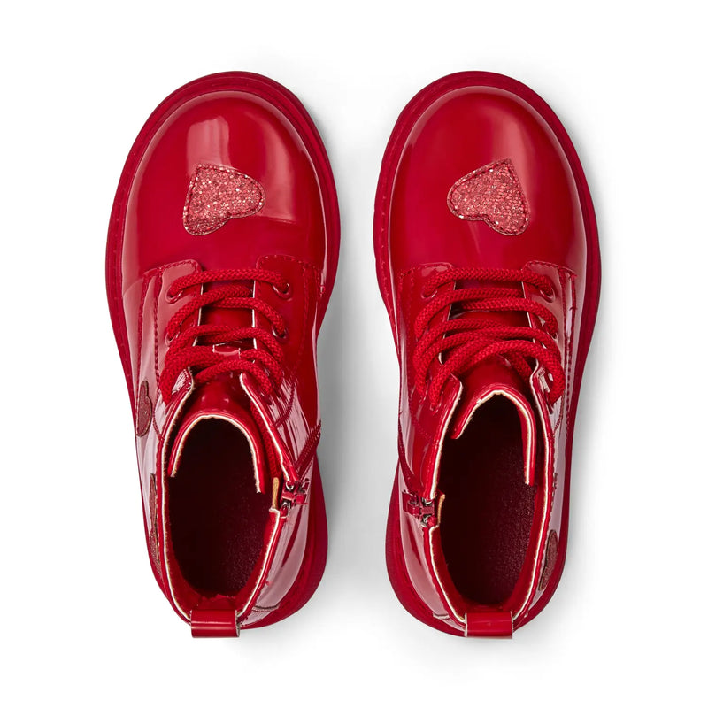 A Dee red boots with glitter hearts.