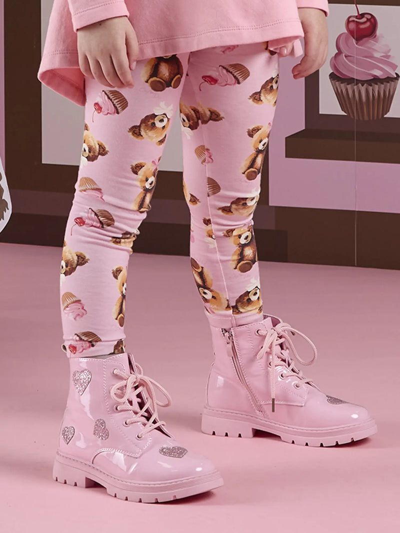 Girl wearing the A Dee amore boots.