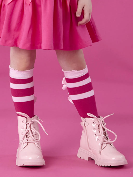 Girl modelling the A Dee amore boots.