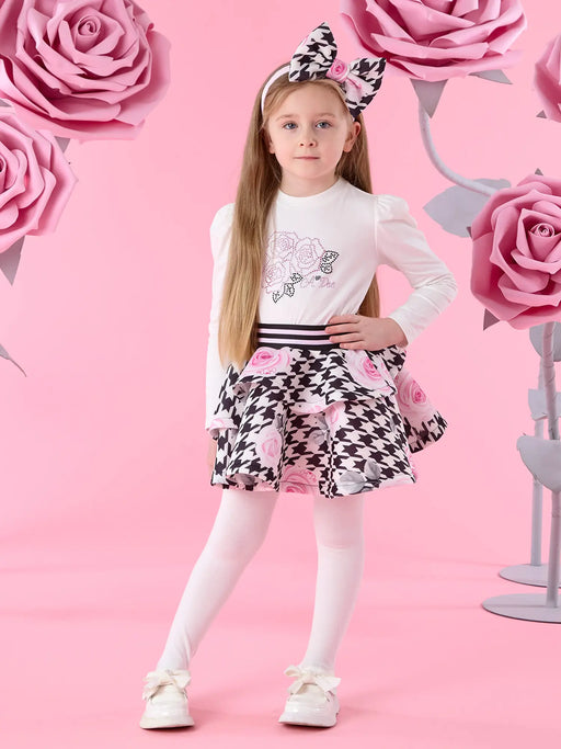 Girl in white anastasia skirt set by A Dee.