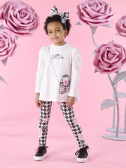 Smiling Girl modelling the A Dee arabella leggings set.
