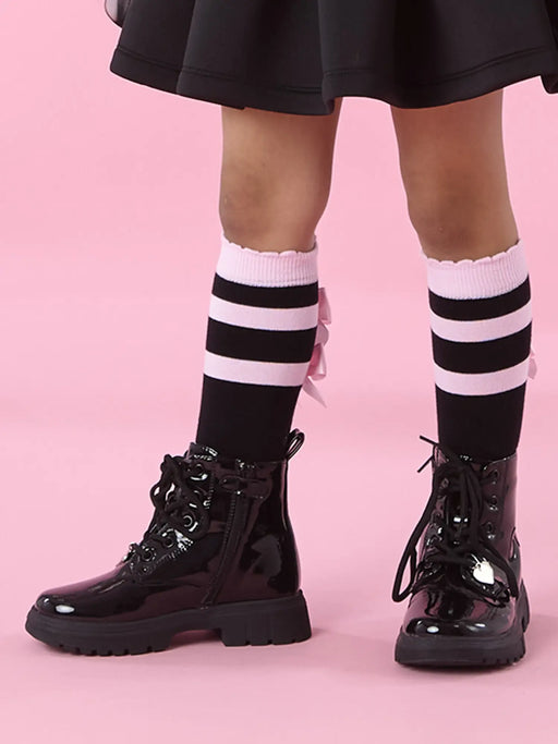 Girl modelling the A Dee astrid knee socks.