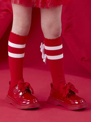 Girl modelling the A Dee astrid knee socks.