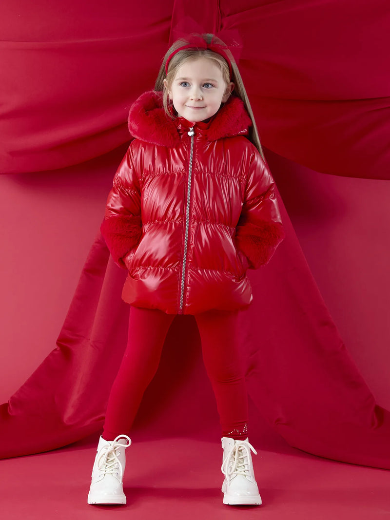 Girl wearing the A Dee avery puffer jacket.
