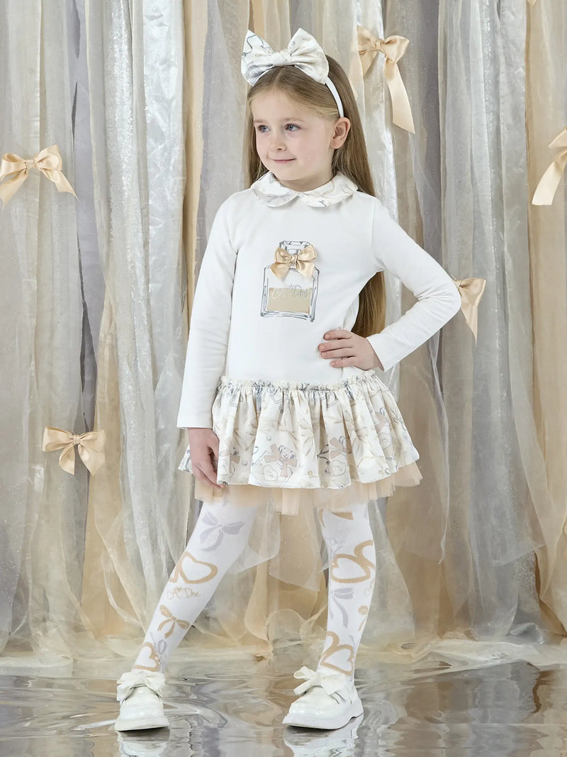 Girl wearing the A Dee betty dress.