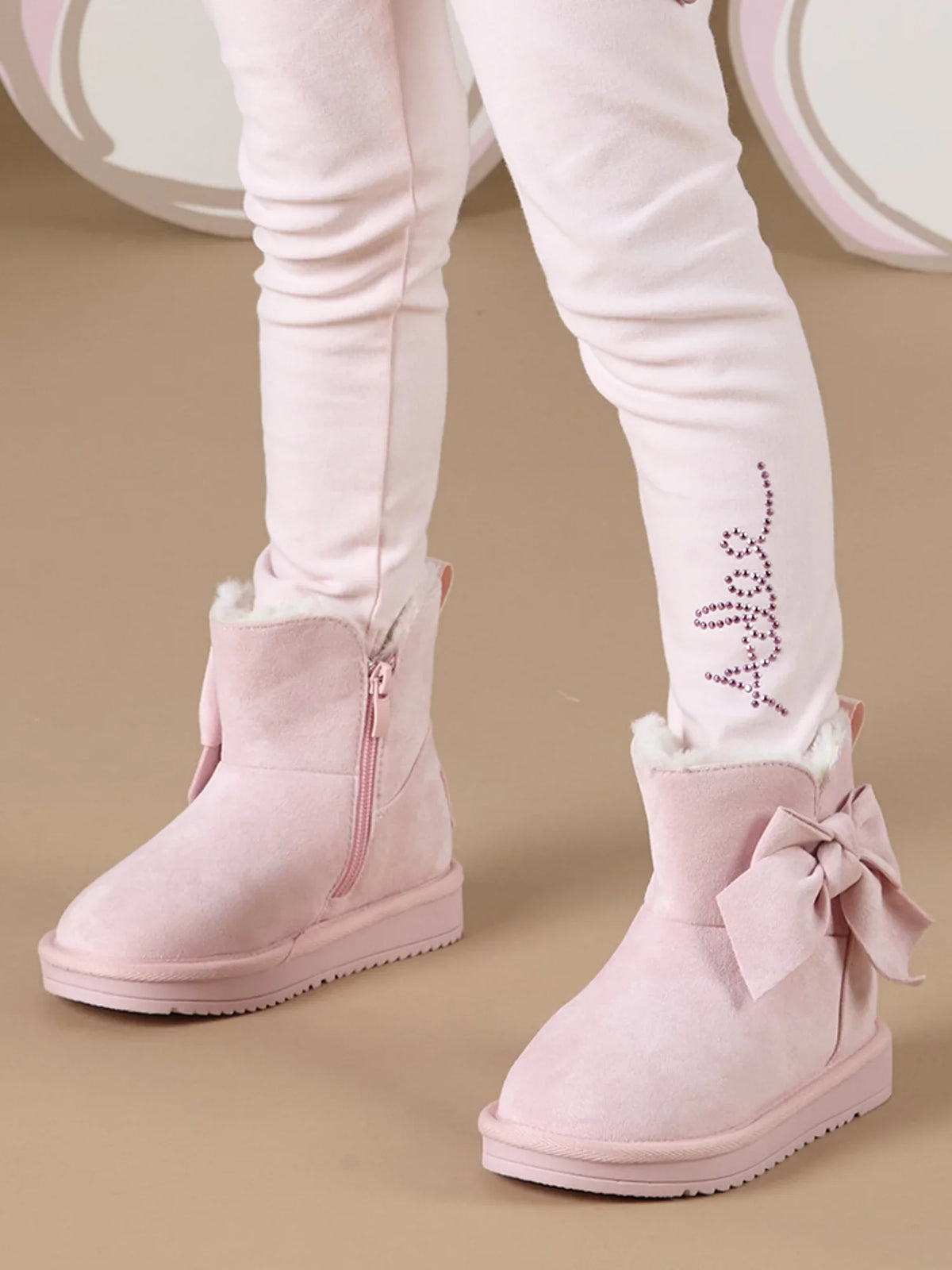 Pink bow boots best sale