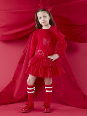 Girl wearing the A Dee brandy dress.