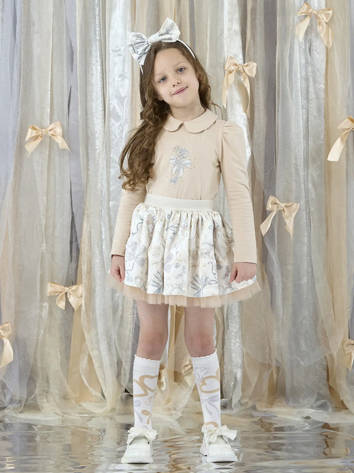 Girl wearing the A Dee brie skirt set.