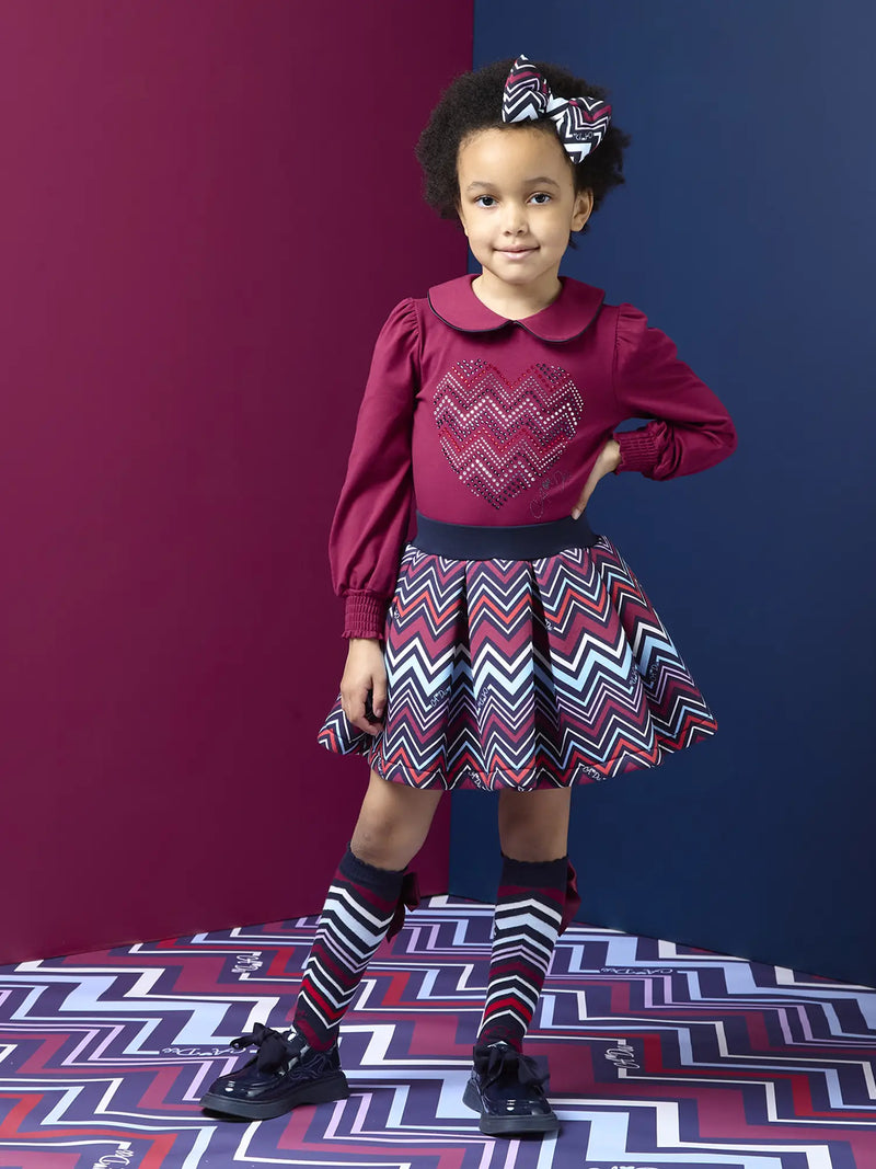 Girl wearing the A Dee chloe skirt set.