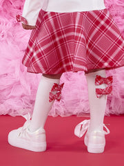 A Dee white socks with bows on the back.