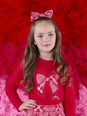 girl wearing the A Dee leighton hair bow.