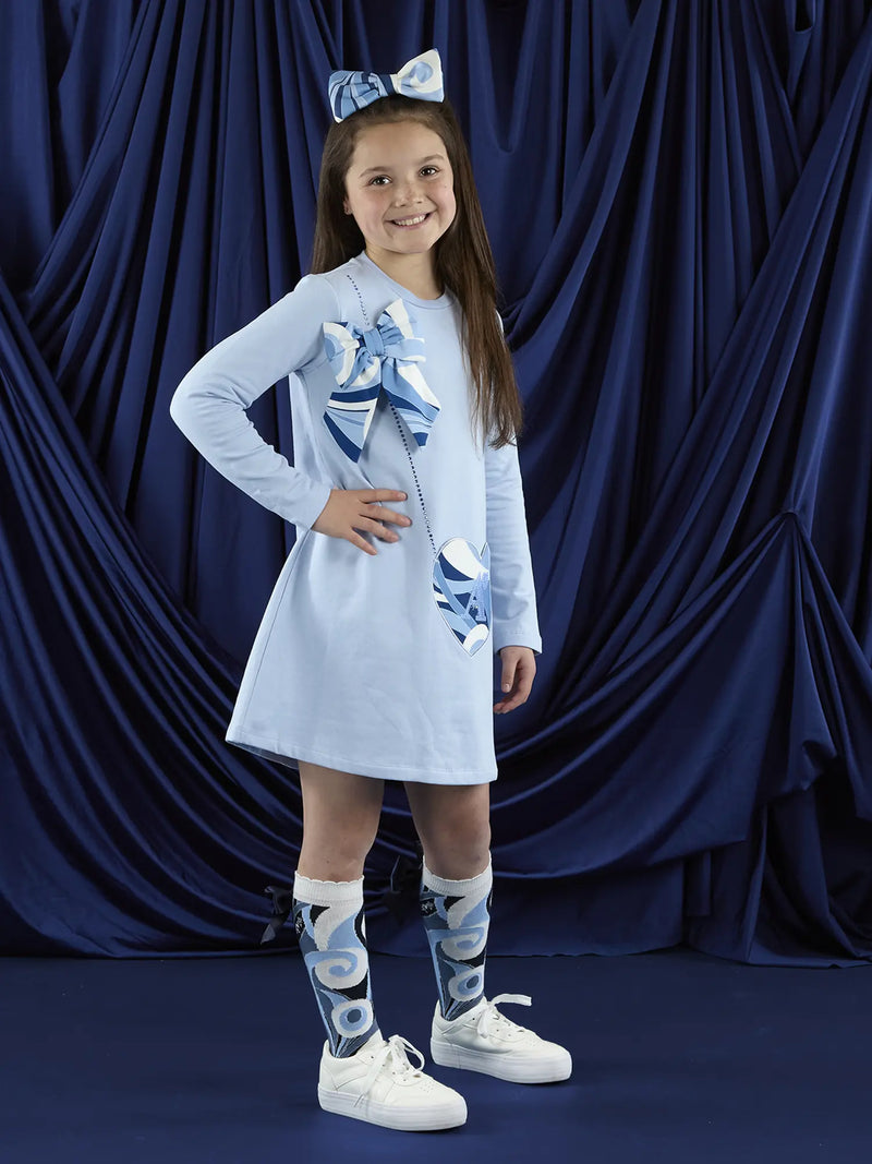 Girl modelling the A Dee lotus dress.