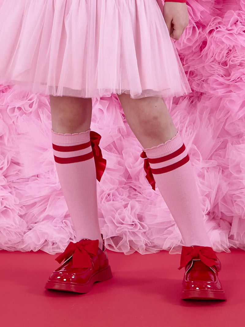 Girl modelling the A Dee lucy knee socks.