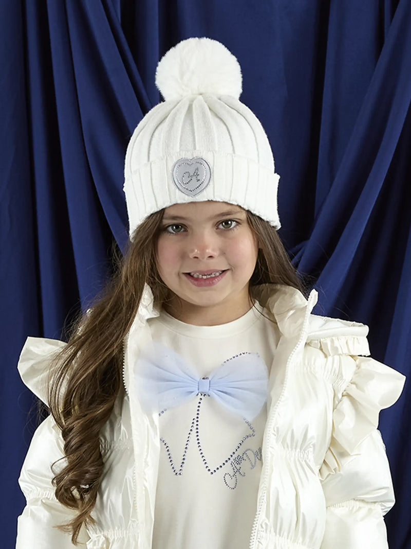 Girl wearing the A Dee mallory bobble hat.