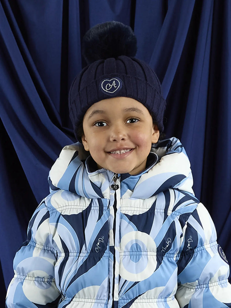 Smiling Girl modelling the A Dee mallory bobble hat.