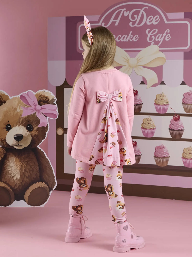 A Dee pink leggings set with bow on the back.