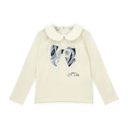 Girl's cream white long sleeve top.