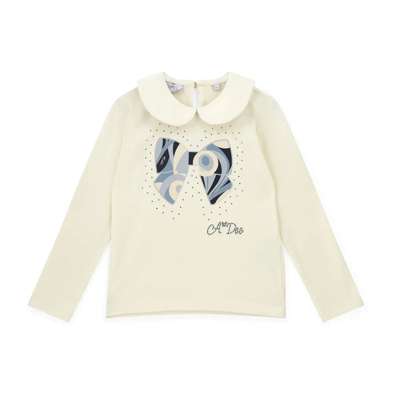 Girl's cream white long sleeve top.