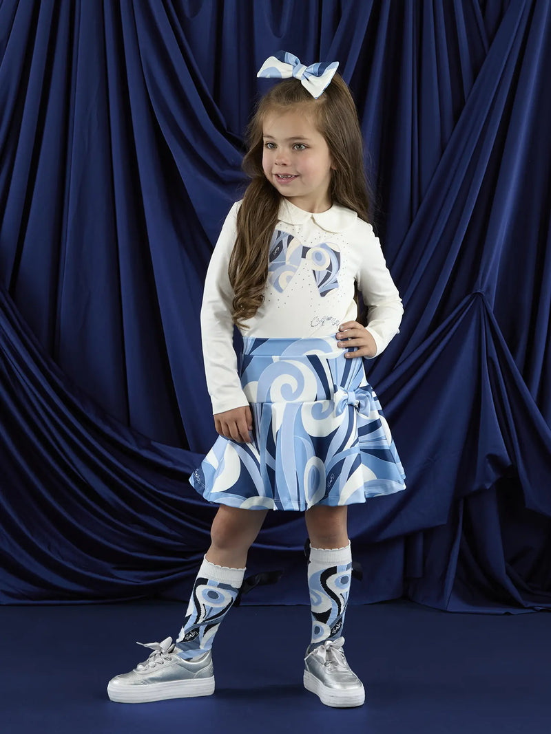 Girl wearing the A Dee nellie skirt set.