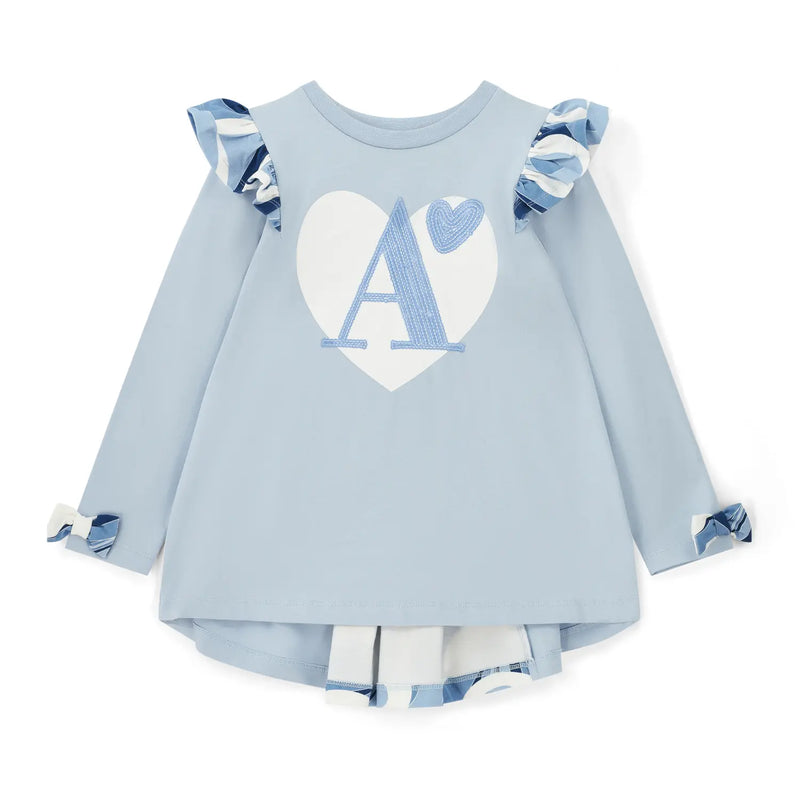 Girl's powder blue top.