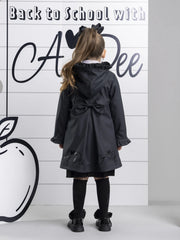 Closer look at the A Dee nova raincoat showing detail of the large bow on the back.