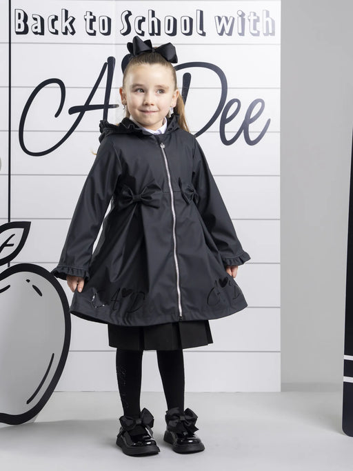 Girl modelling the A Dee nova raincoat.