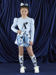 Girl modelling the A Dee nova shorts set.