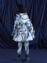 A Dee blue coat with large bow on the back.