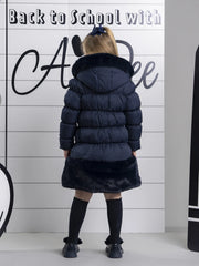 A Dee rhea coat with navy faux fur trim.