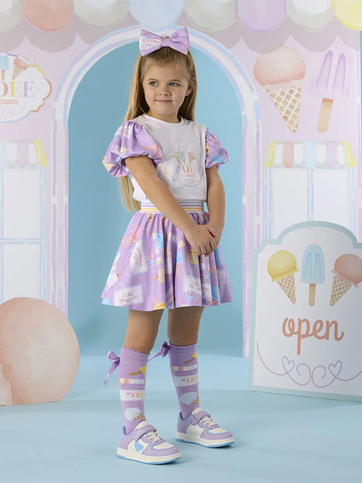 Girl modelling the A Dee sally skirt set.