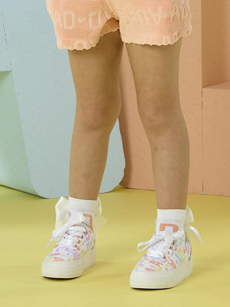 Girl wearing the A Dee sasha socks.