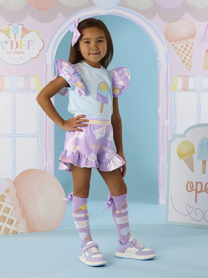 Girl wearing the A Dee sia shorts set.